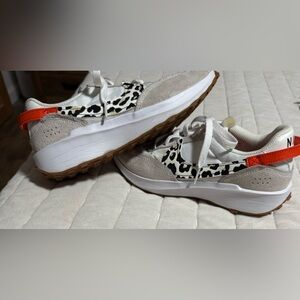 Stylish Nike Waffle Leopard Print Sneakers with Red/Orange Accents